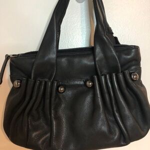 - Black leather Wanlima purse, beautiful soft leather with heavy hardware.